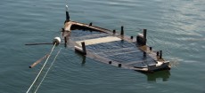 Sinking ship via Jose Luis Mesa/Shutterstock.com