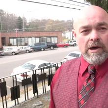In this image made from a video provided by WATE, shows Jamie Coots, a pastor, who appeared on the National Geographic television reality show "Snake Salvation," in Knoxville, Tenn. Coots died Sunday, Feb. 16, 2014, after being bitten by a snake. (AP PHOTO/WATE, Jill McNeal)