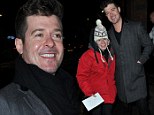 What a guy! Robin Thicke shows his generous spirit by giving homeless woman £20 note ahead of his concert with Maroon 5