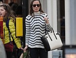Pippa looked chic in navy and white out and about in London yesterday with her Aspinal arm-candy and chic Alice boots