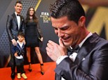 Ronaldo struggles to hold back the tears as his son joins him to collect prestigious football award... before he sparks wedding rumours by calling Irina Shayk his 'wife'