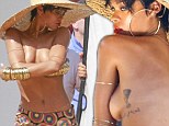 Well she is a Bad Gal! Rihanna reveals tan lines as she poses topless for Vogue Brazil in beach photoshoot