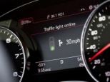 Audi's latest feature will tell drivers when traffic lights are about to change - and warn if you're about to run a red light.