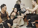 Need a hand? Gymnast Beth Tweddle is helped with her skates by Lukasz Rozycki in the Dancing On Ice dressing rooms