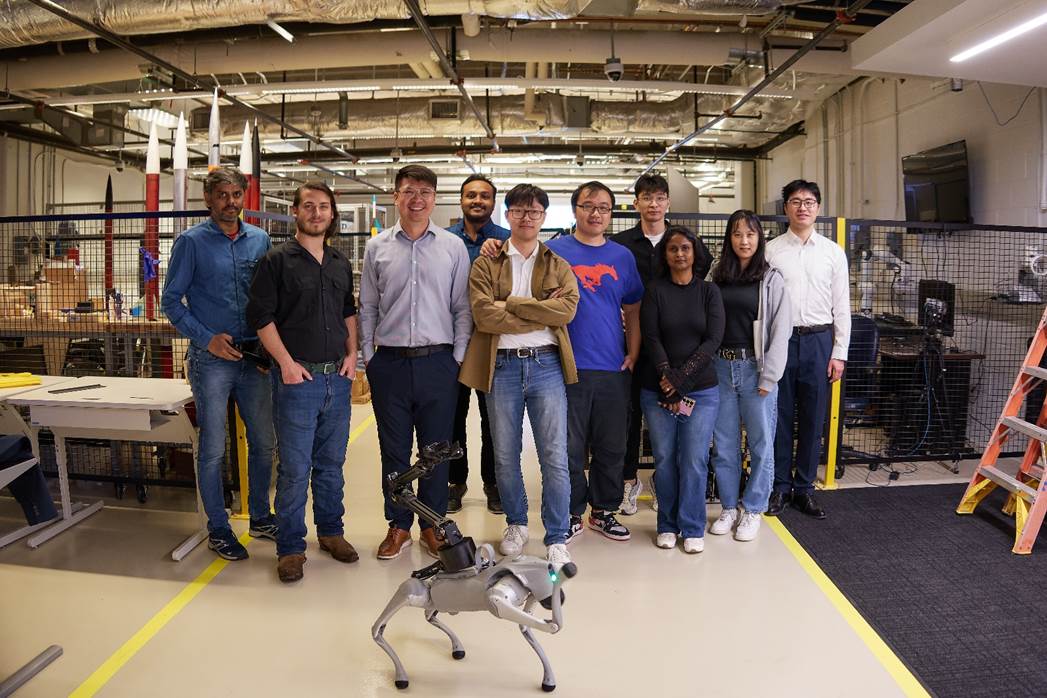 A group of people standing in a factory
AI-generated content may be incorrect.